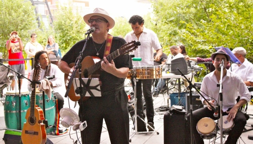 from left to right: Renato Thoms, conga; JuanMa Morales, guitar; Nestor Villar, timbales; and David Freyre, bongos.