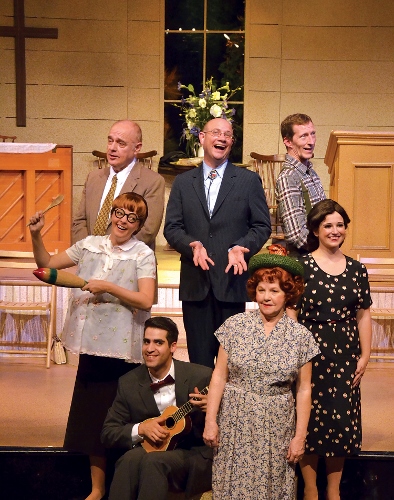 Everything You'll Need: The Rev. Mervin Oglethorpe (John Vessels), center, sings 'Everything You'll Need' with the Singing Sanders Family (from left) Burl Sanders (Bob Payne), June Sanders (Sarah Hund), Dennis Sanders (Will Boyajian), Vera Sanders (Pam Pendleton), Dennis Sanders (Brian Gunter) and Denise Sanders Culpepper (Christina Rose Rahn) in Beef & Boards Dinner Theatre's production of Smoke on the Mountain: Homecoming. This sequel in the popular bluegrass gospel series is on stage through Aug. 16. Tickets include Chef Odell Ward's dinner buffet.