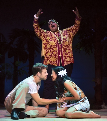 Bloody Mary (Cynthia Thomas) sings 'Happy Talk' to Lt. Joseph Cable (Mickey Rafalski) and Liat (Arianne Villareal) in Beef & Boards Dinner Theatre's production of South Pacific. The Rodgers & Hammerstein musical is now on stage through Oct. 4. Tickets include Chef Odell Ward's dinner buffet.