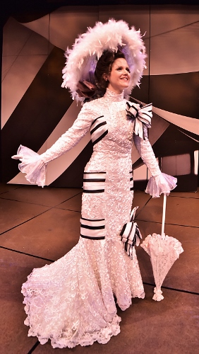 Eliza Doolittle (Kimberly Doreen Burns) makes her first appearance among high society to test her ability to convince them that she is a proper lady in Beef & Boards Dinner Theatre’s production of My Fair Lady, now on stage through May 14. The Tony Award winning musical is returning to the Beef & Boards stage after a 20-year hiatus.