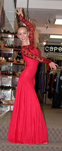 Red dress with black lace accents by Star Styled. 'Tara' shoes by Freed of London. Modeled by Skylar Brandt. Available at <a href='http://www.onstagedancewear.com'>OnStageDancewear.com</a>.