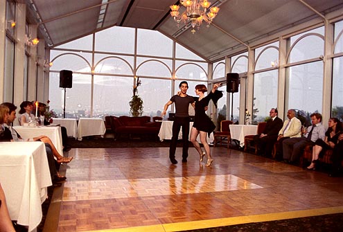 Simone Assboeck and Ernesto Alonso Palma of Stepping Out Studios perform a Salsa