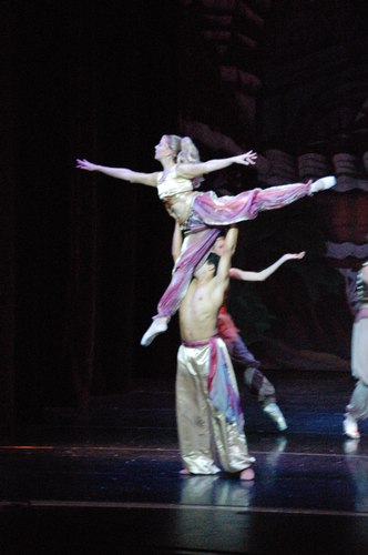 Kirsten Heinrich lifted by her partner, Raymon Ashley, as guest artists in The Nutcracker for Black Mountain Dance Centre.