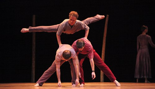 Houston Ballet's program: Of An Era Ballet: Jardi Tancat choreographed by Nacho Duato Dancers: Oliver Halkowich (top) cart wheeling over Ian Casady & Connor Walsh 